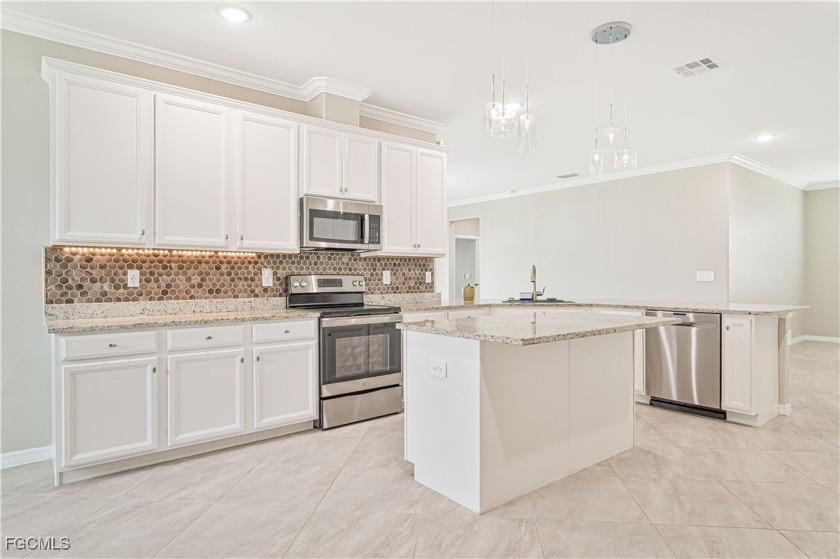 Welcome to this beautifully upgraded 4-bedroom, 3-bath home - Beach Home for sale in Fort Myers, Florida on Beachhouse.com