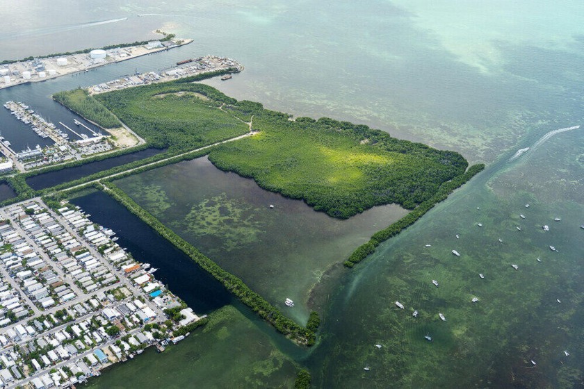Nestled along the serene waterfront, these two picturesque - Beach Lot for sale in Stock Island, Florida on Beachhouse.com