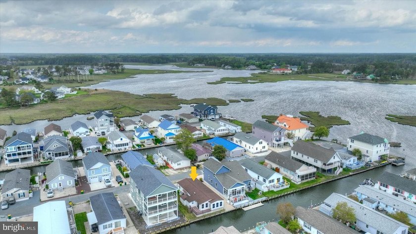 Tucked along a peaceful canal in the sought-after Swann Keys - Beach Home for sale in Selbyville, Delaware on Beachhouse.com