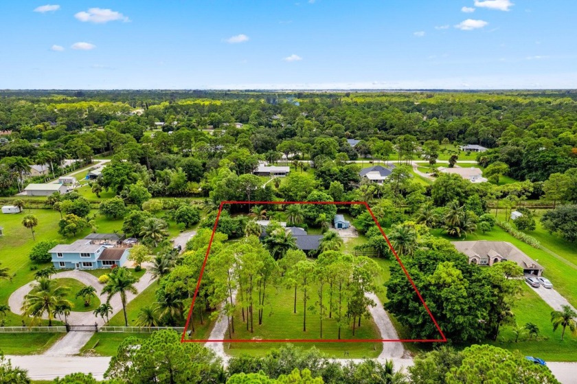 Welcome to this charming property, perfectly situated on a - Beach Home for sale in West Palm Beach, Florida on Beachhouse.com