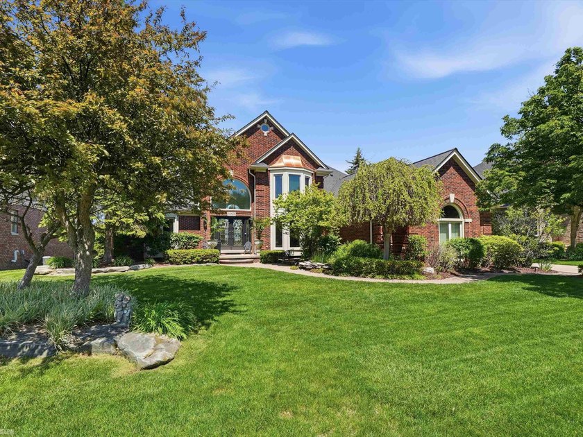 Enjoy lakefront living at its finest in this stunning 4 bedroom - Beach Home for sale in Shelby, Michigan on Beachhouse.com