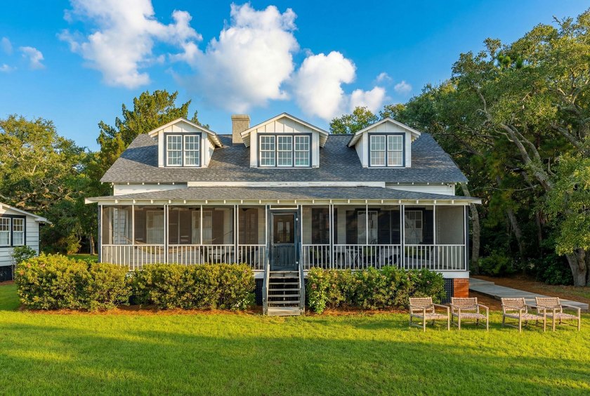 Tucked beneath a canopy of majestic live oaks along the serene - Beach Home for sale in Pawleys Island, South Carolina on Beachhouse.com