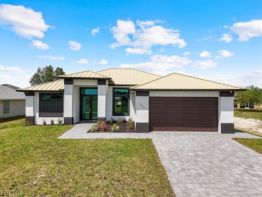 Experience elevated Florida living in this exceptional new - Beach Home for sale in Cape Coral, Florida on Beachhouse.com