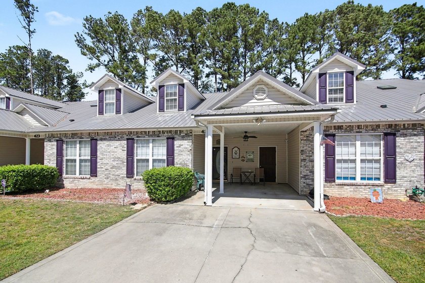 This 3-bedroom, 2-bath townhome-style condo with a carport - Beach Condo for sale in Longs, South Carolina on Beachhouse.com