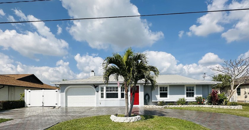 Discover unparalleled waterfront living in this exquisite - Beach Home for sale in Port Saint Lucie, Florida on Beachhouse.com