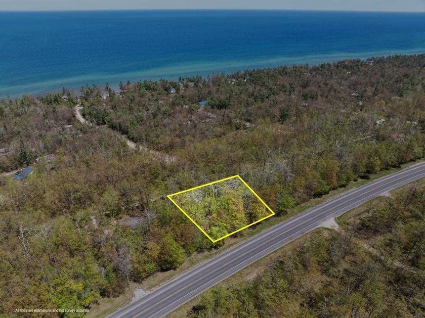 Half-acre wooded lot in Cordwood Point with deeded access to - Beach Lot for sale in Cheboygan, Michigan on Beachhouse.com