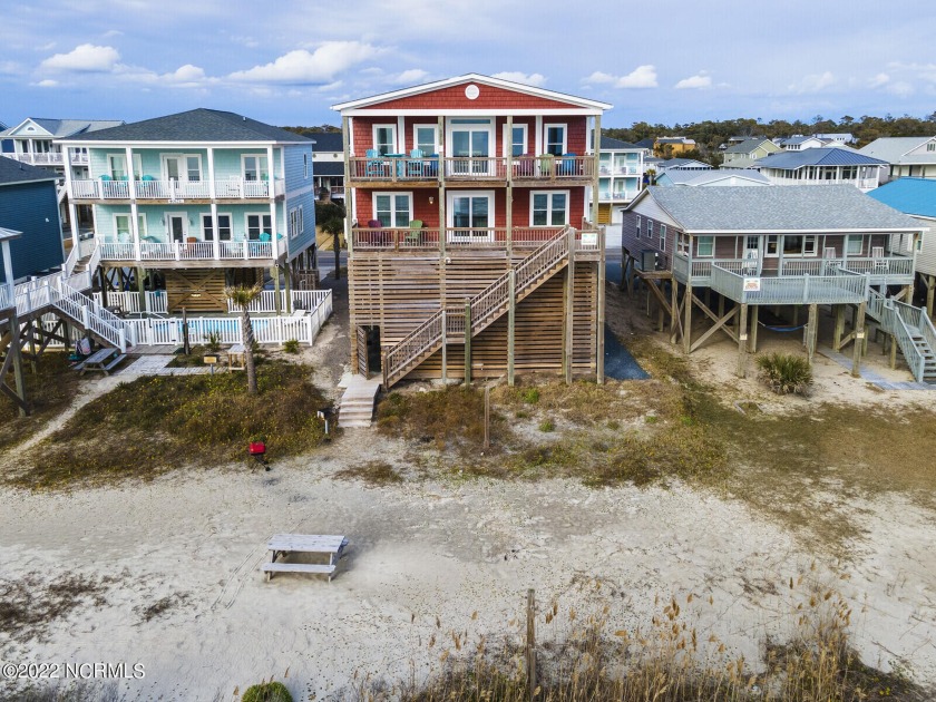 Designed for indoor and outdoor fun, each floor connects - Beach Home for sale in Oak Island, North Carolina on Beachhouse.com