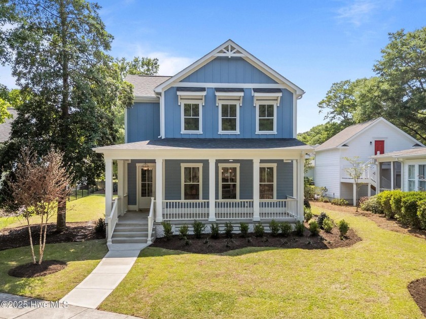 This JUST COMPLETED stunning new construction residence is ready - Beach Home for sale in Calabash, North Carolina on Beachhouse.com