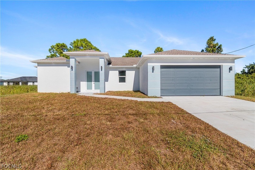 Discover modern luxury in this stunning new construction home - Beach Home for sale in Lehigh Acres, Florida on Beachhouse.com