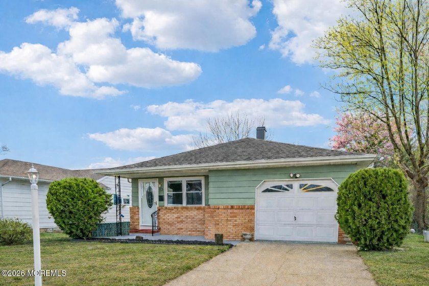 Bright and inviting home set on a large, private lot backing to - Beach Home for sale in Toms River, New Jersey on Beachhouse.com