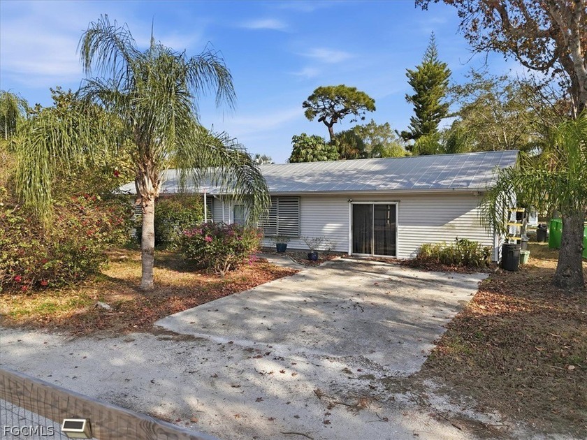 Opportunity awaits with this 3-bedroom, 2-bath home located on a - Beach Home for sale in North Fort Myers, Florida on Beachhouse.com