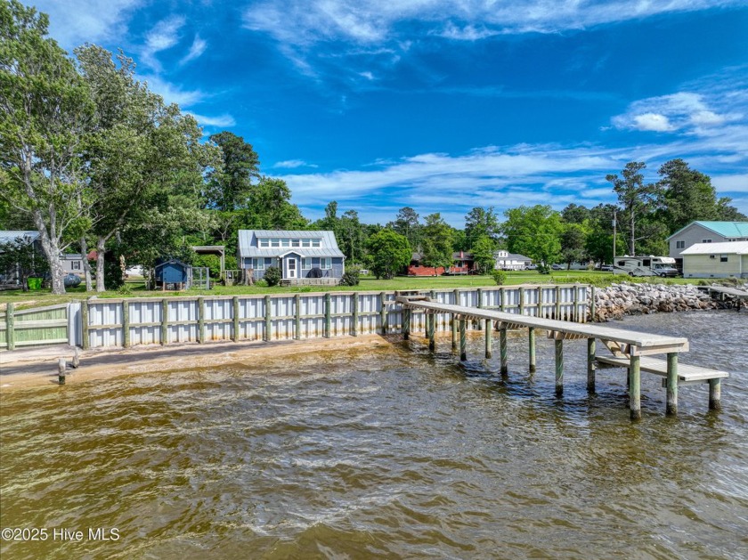 Enjoy peaceful riverfront living in this unique log cabin-style - Beach Home for sale in Havelock, North Carolina on Beachhouse.com