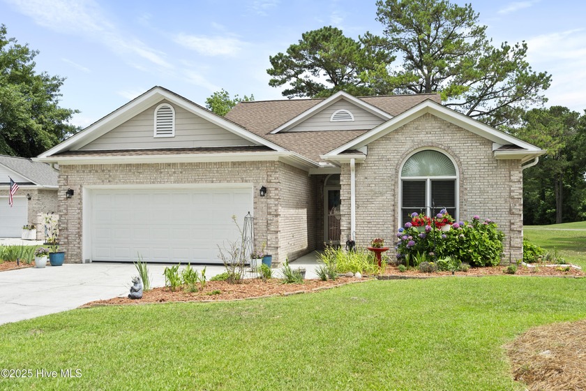 Located on the 10th hole of the prestigious North Shore Golf - Beach Home for sale in Sneads Ferry, North Carolina on Beachhouse.com