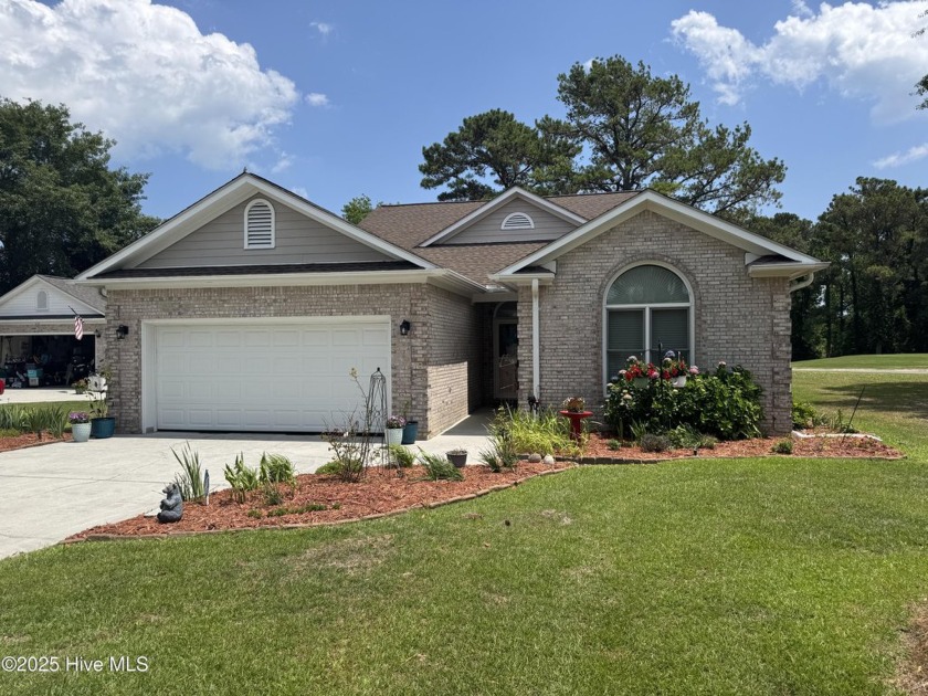Located on the 10th hole of the prestigious North Shore Golf - Beach Home for sale in Sneads Ferry, North Carolina on Beachhouse.com