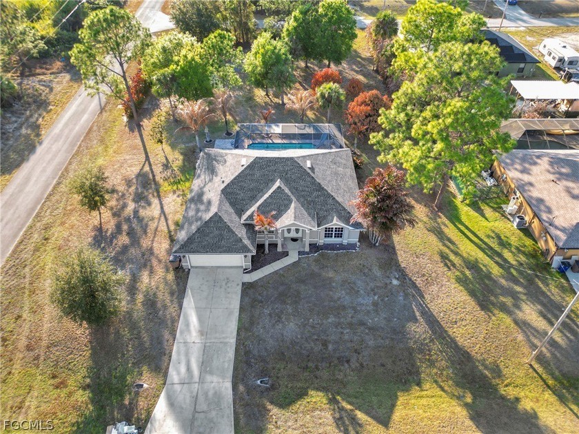 Spacious single-family home situated on an oversized 0.78-acre - Beach Home for sale in Lehigh Acres, Florida on Beachhouse.com