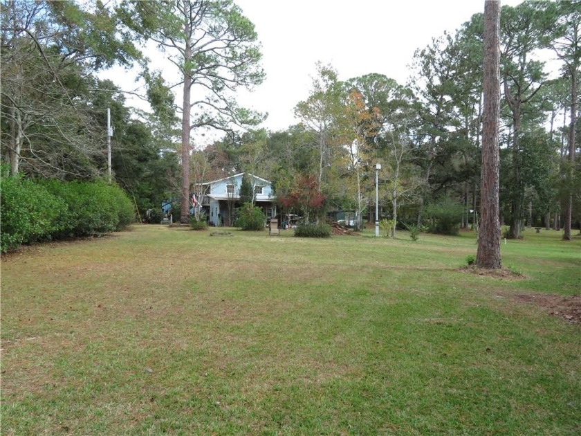 Beautiful 1.78 acres with 122 feet on Nolte Creek with deep - Beach Home for sale in Foley, Alabama on Beachhouse.com