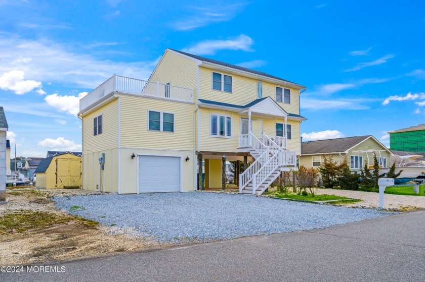 Welcome to your dream waterfront retreat!   Nestled just a short - Beach Home for sale in Little Egg Harbor, New Jersey on Beachhouse.com