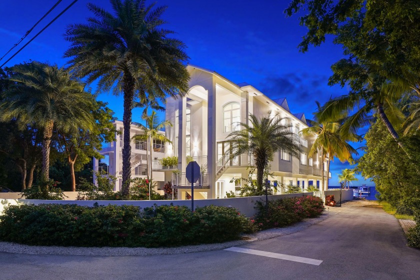 Nestled in Tavernier & rebuilt in 2015, this 5 BD + 5.5 BA villa - Beach Home for sale in Key Largo, Florida on Beachhouse.com