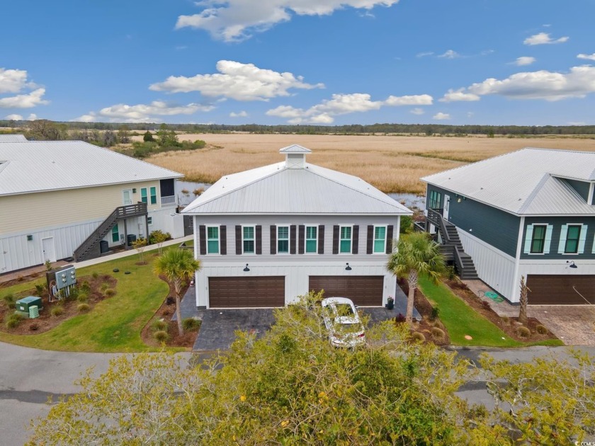 Experience the pinnacle of Lowcountry living with this - Beach Townhome/Townhouse for sale in Pawleys Island, South Carolina on Beachhouse.com