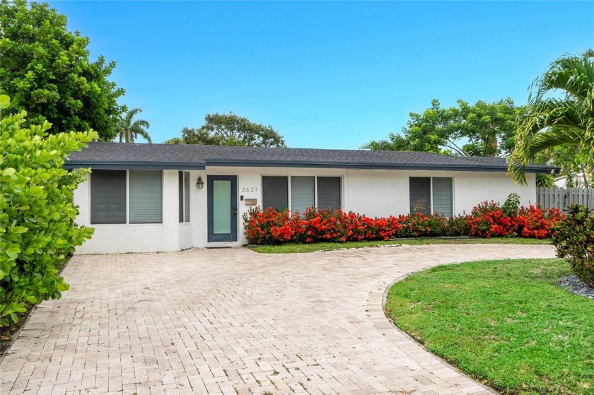 With no HOA, a turnkey living experience, and thoughtfully - Beach Home for sale in Pompano Beach, Florida on Beachhouse.com