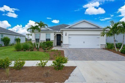 This popular 3-bedroom + den/home office floor plan with a 2-car - Beach Home for sale in Punta Gorda, Florida on Beachhouse.com