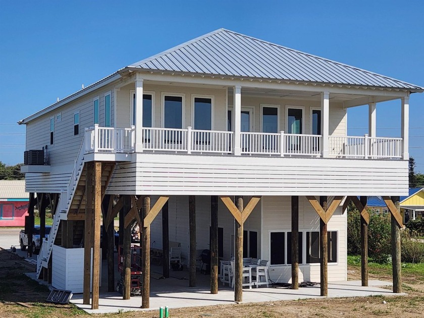 Location! Location! Location! This exquisite newly constructed - Beach Home for sale in Grand Isle, Louisiana on Beachhouse.com