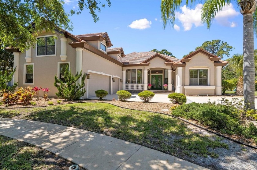 Welcome to 67 Eastlake Drive.  A sanctuary nestled at the end of - Beach Home for sale in Palm Coast, Florida on Beachhouse.com