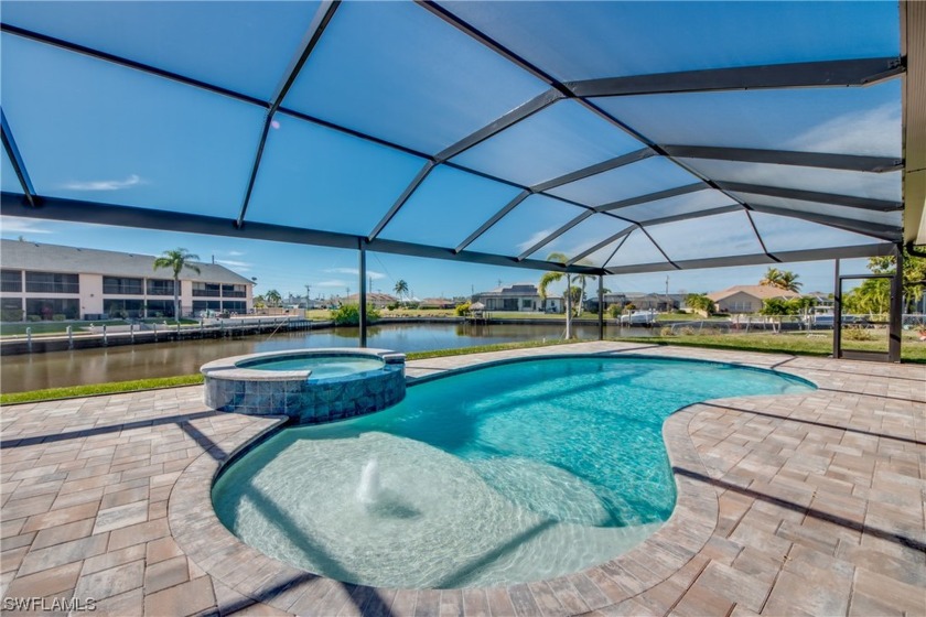 Welcome to your dream waterfront oasis! This immaculate home - Beach Home for sale in Cape Coral, Florida on Beachhouse.com