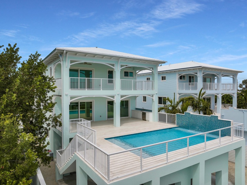 Brand new oceanfront Concrete Home. Coastal-inspired masterpiece - Beach Home for sale in Windley Key, Florida on Beachhouse.com