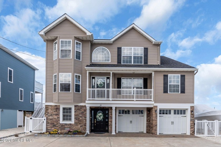Welcome to your dream waterfront retreat in the highly sought - Beach Home for sale in Manahawkin, New Jersey on Beachhouse.com