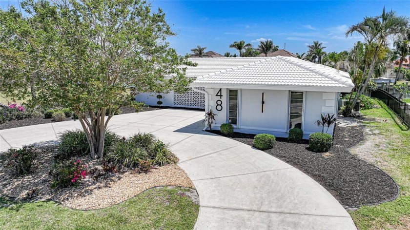 Location and style! One of a kind, Palm Springs breeze block - Beach Home for sale in Punta Gorda, Florida on Beachhouse.com