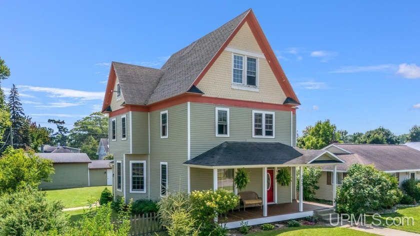 Step Into History with This Stunning Gladstone Home! Welcome to - Beach Home for sale in Gladstone, Michigan on Beachhouse.com