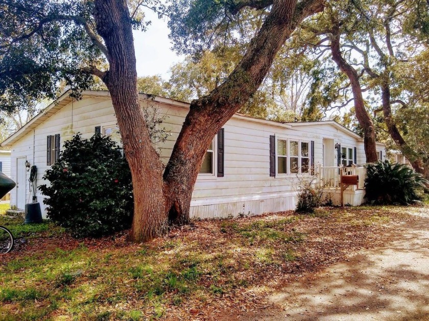 Live the beach life in this 3 bedroom, 2 bathroom home situated - Beach Home for sale in Myrtle Beach, South Carolina on Beachhouse.com