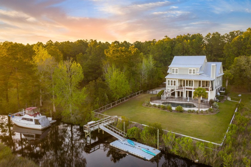 Enjoy breathtaking sunsets on Awendaw Creek in this stunning - Beach Home for sale in Awendaw, South Carolina on Beachhouse.com