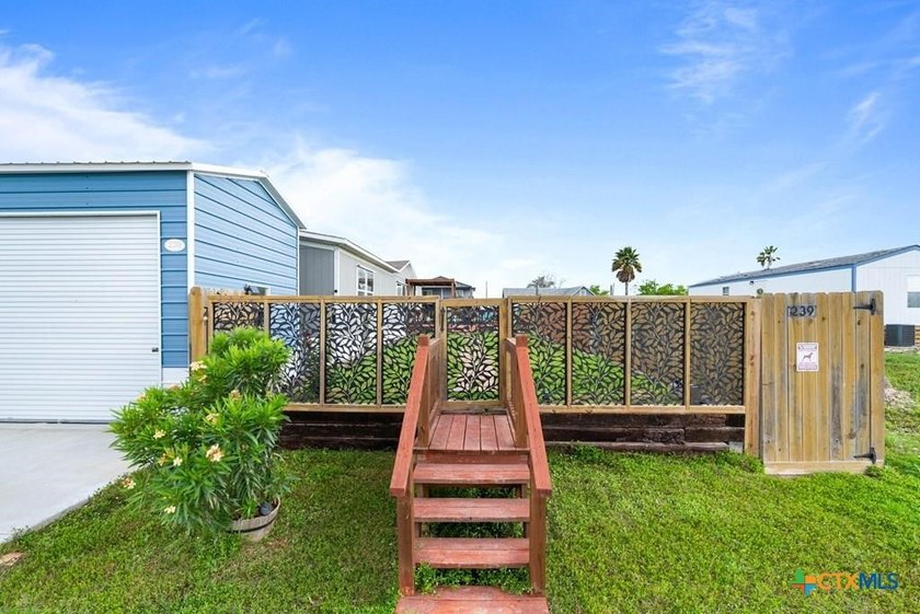 Canal front!! This 2023, 3 bedroom 2 bath Clayton home with an - Beach Home for sale in Rockport, Texas on Beachhouse.com