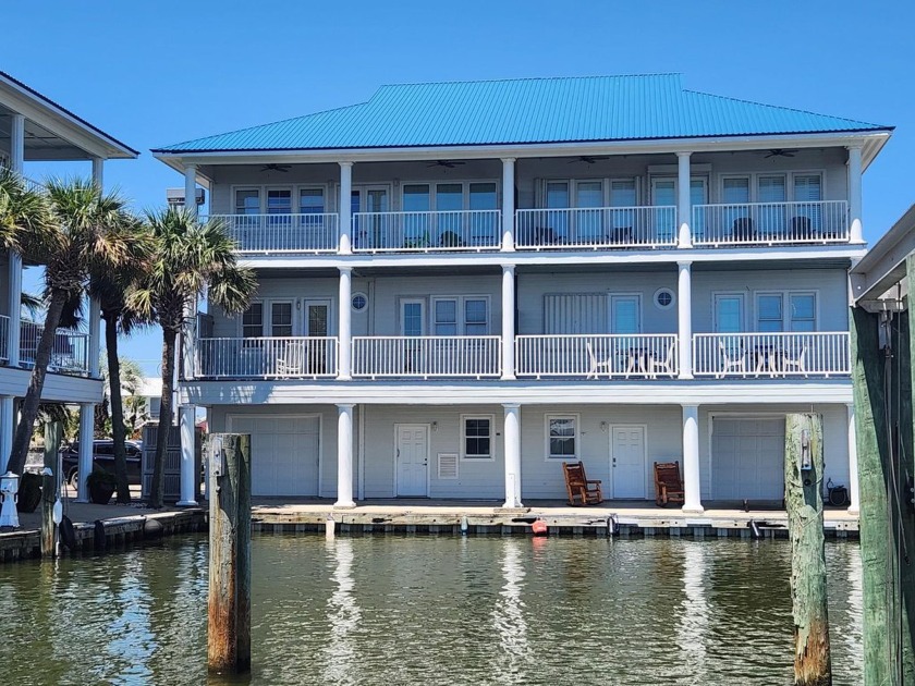 Make this waterfront 3-level condo in Pirates Cove Development - Beach Condo for sale in Grand Isle, Louisiana on Beachhouse.com