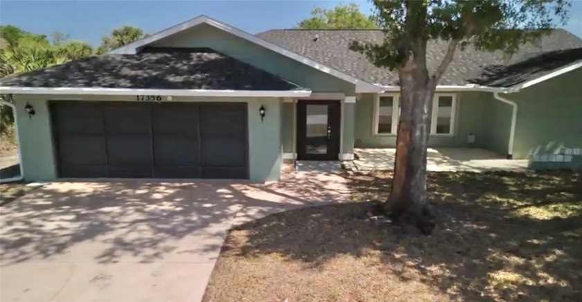 Waterfront living in Southwest Florida! Step inside this custom - Beach Home for sale in Port Charlotte, Florida on Beachhouse.com