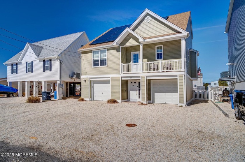 Welcome to this exceptional 4-bedroom, 2.5-bathroom waterfront - Beach Home for sale in Manahawkin, New Jersey on Beachhouse.com