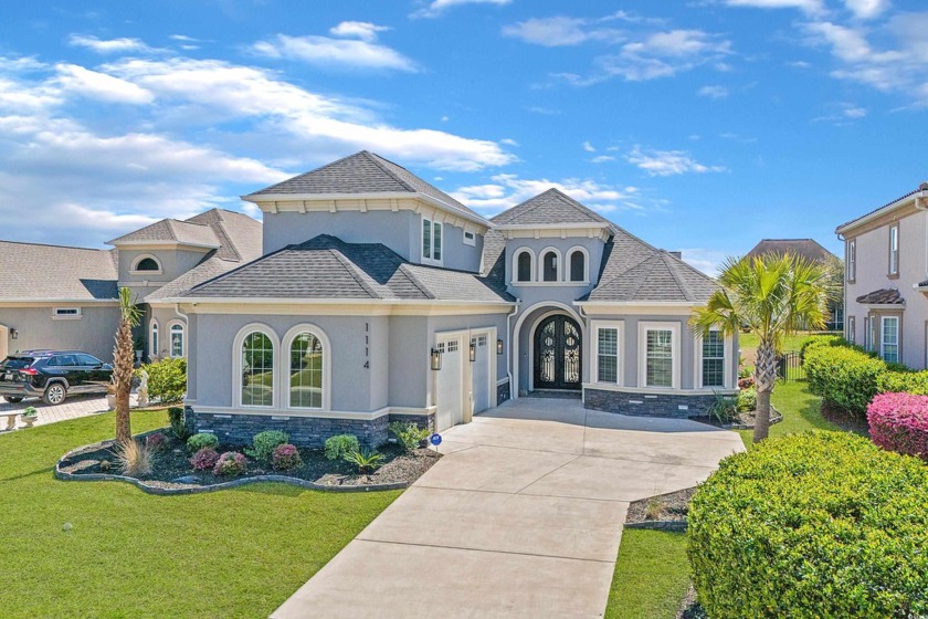 Situated in the prestigious Carolina Waterway Plantation, this - Beach Home for sale in Myrtle Beach, South Carolina on Beachhouse.com