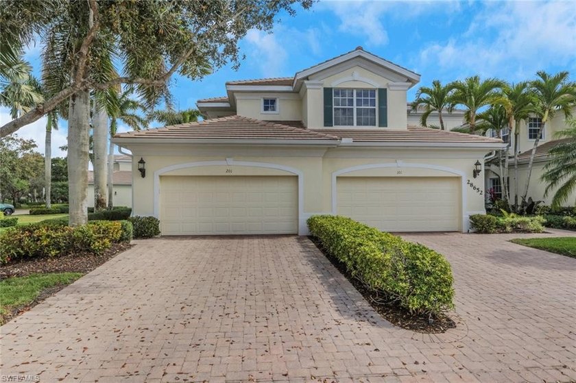This well-cared for, rarely occupied, Coach Home sited on a - Beach Condo for sale in Bonita Springs, Florida on Beachhouse.com