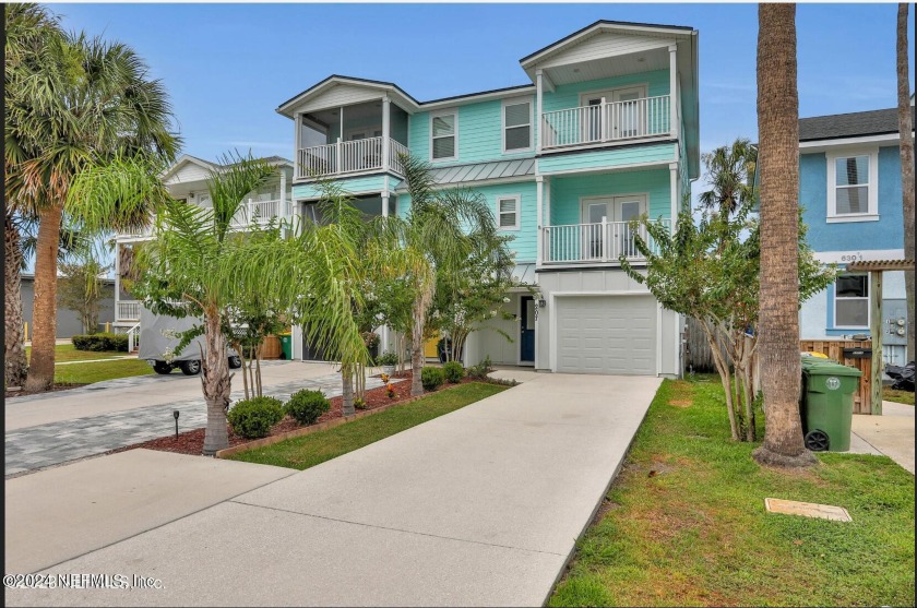 Discover beachside living in this exquisite 3-level townhome - Beach Townhome/Townhouse for sale in Jacksonville Beach, Florida on Beachhouse.com