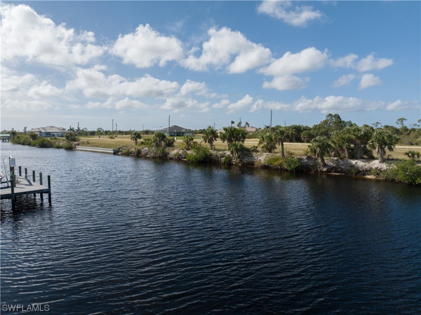 Nestled in an enclave practically surrounded by water, this - Beach Lot for sale in Cape Coral, Florida on Beachhouse.com