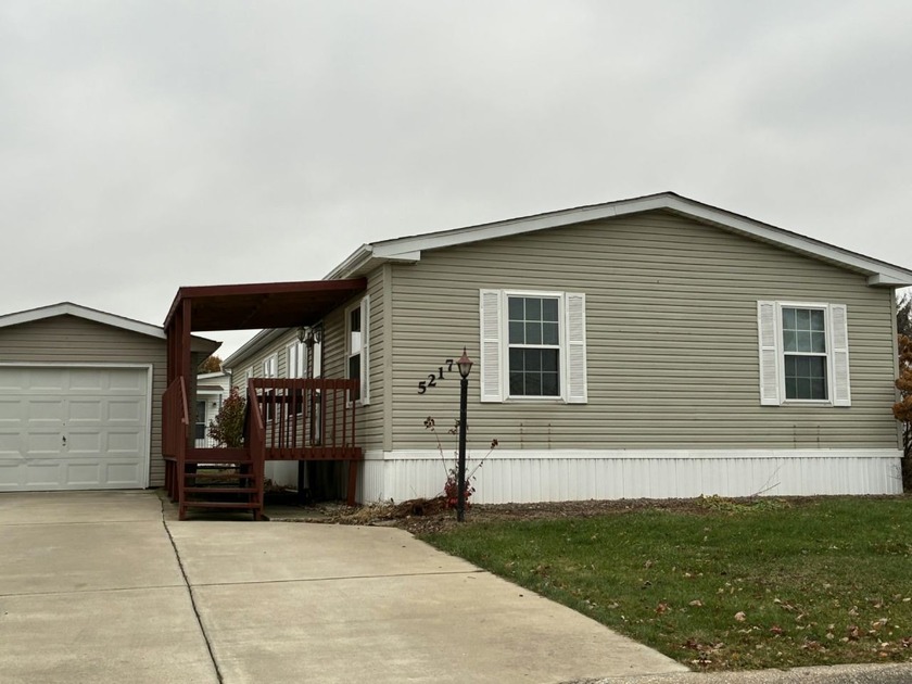 This beautifully maintained home offers 1,680 square feet of - Beach Home for sale in Portage, Indiana on Beachhouse.com