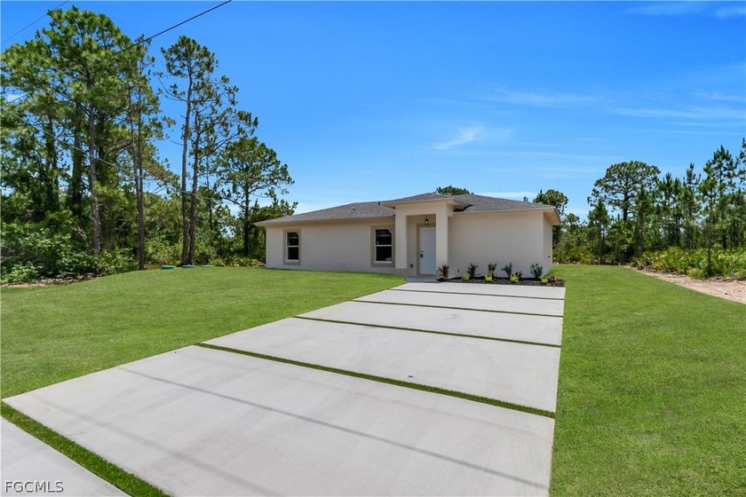 Beautiful newly built property featuring 3 spacious bedrooms and - Beach Home for sale in Lehigh Acres, Florida on Beachhouse.com