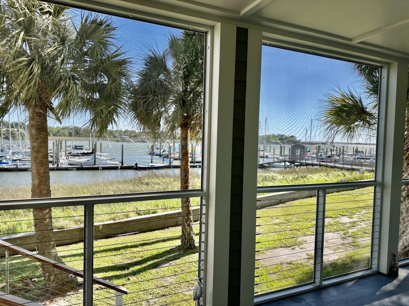 The views of Folly River are breathtaking from this first-floor - Beach Home for sale in Folly Beach, South Carolina on Beachhouse.com