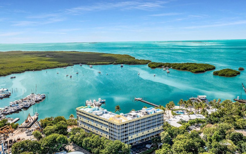 Discover the epitome of bayfront living in this  furnished - Beach Condo for sale in Key Largo, Florida on Beachhouse.com