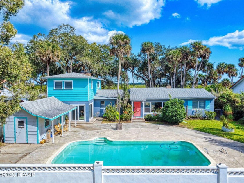 Breathtaking Sunsets Await in this Timeless Retro Waterfront - Beach Home for sale in New Smyrna Beach, Florida on Beachhouse.com