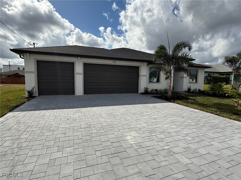 Welcome to your dream home! This stunning Hardwyn Signature - Beach Home for sale in Cape Coral, Florida on Beachhouse.com