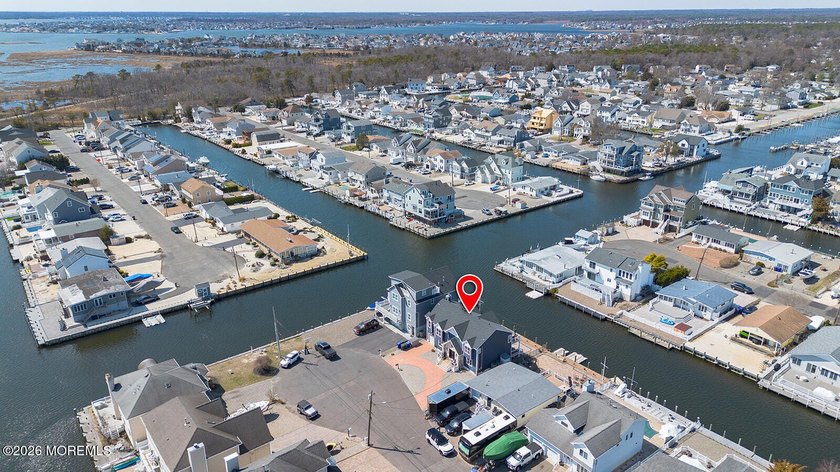 Wake up each day to breathtaking lagoon views in this - Beach Home for sale in Brick, New Jersey on Beachhouse.com