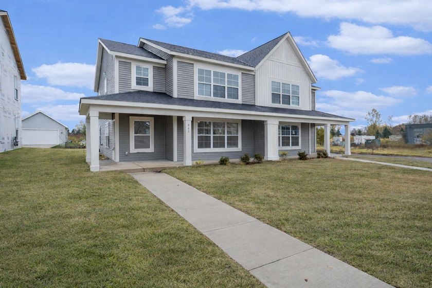 The home includes four well-sized bedrooms, offering flexibility - Beach Condo for sale in Holland, Michigan on Beachhouse.com